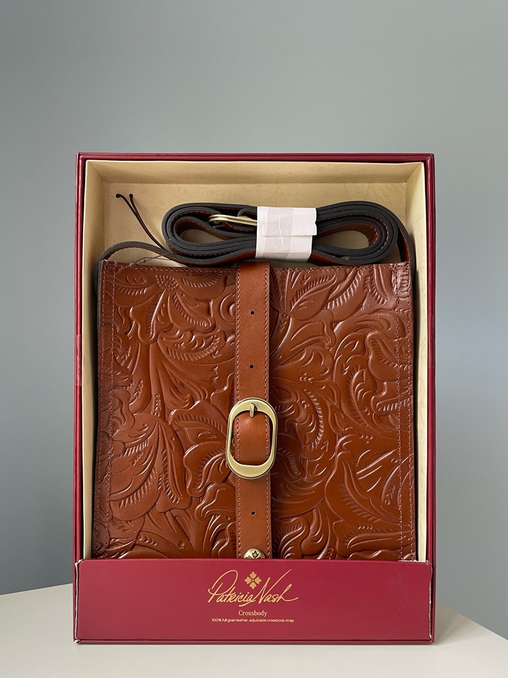 NWT Patricia Nash Cognac Tooled Floral Leather Buckle Crossbody